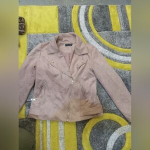 Pink cropped jacket .